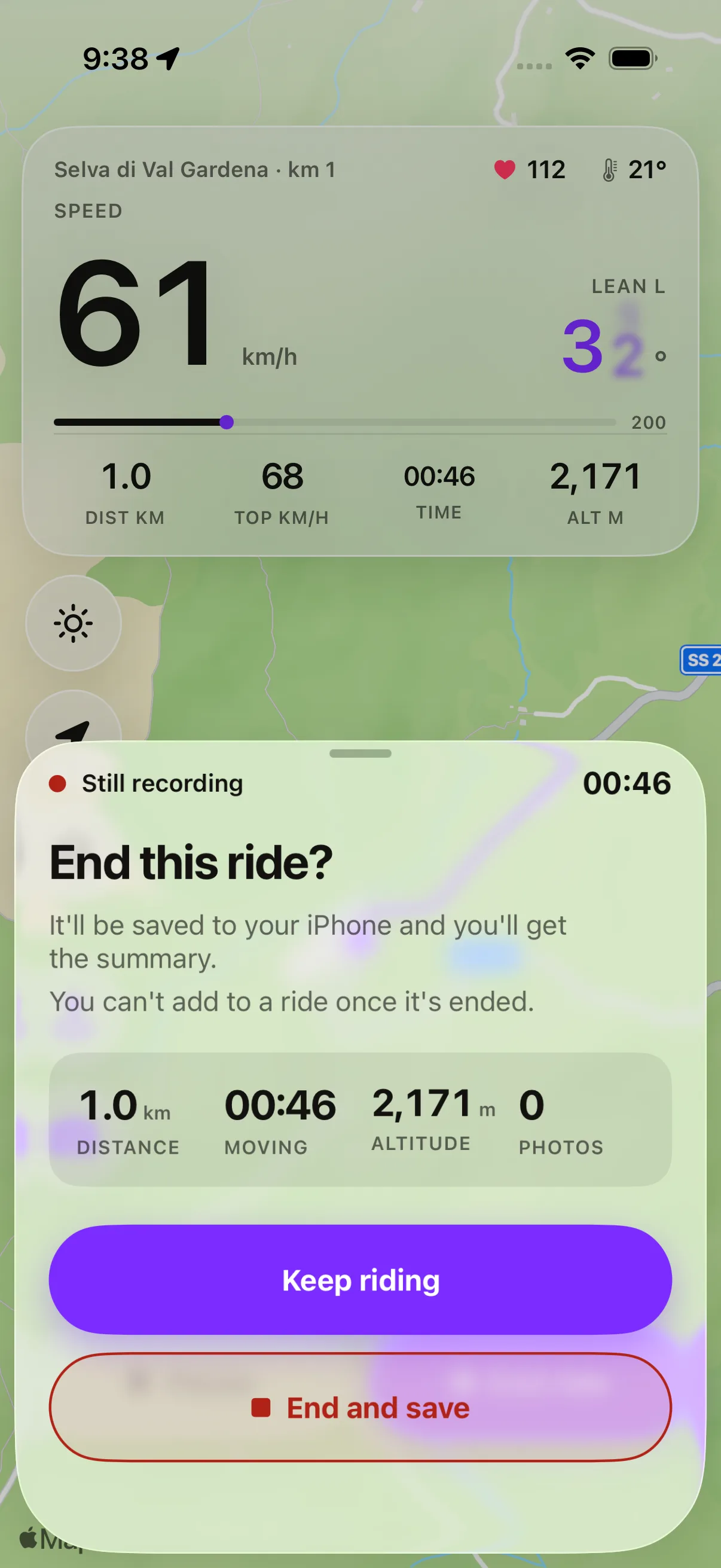 Qroda End ride sheet: a Still recording header with the timer still running, the ride's distance, moving time and photos, then Keep riding and End and save